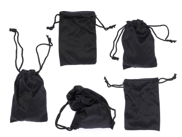 Colección de bolsa de tela negra aislada sobre fondo blanco - Foto, imagen
