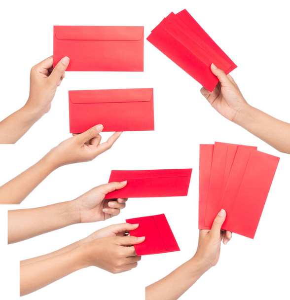 Sbírka rukou držení červené obálky dát v čínštině Nový rok den izolované na bílém pozadí - Fotografie, Obrázek
