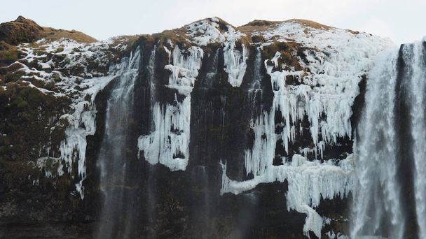 A view scenic frozen waterfall in Iceland - Foto, imagen