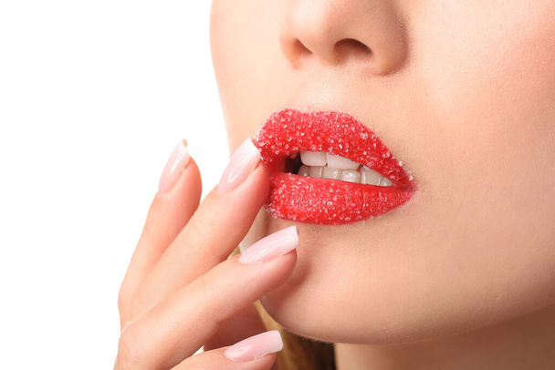 砂糖の唇を持つ美しい若い女性,クローズアップ - 写真・画像
