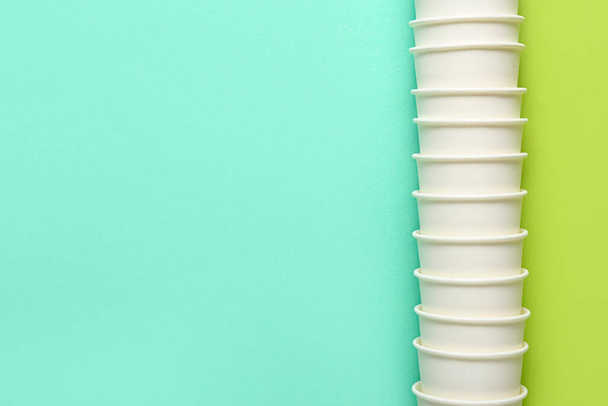 Blank paper cups on color background - Photo, Image
