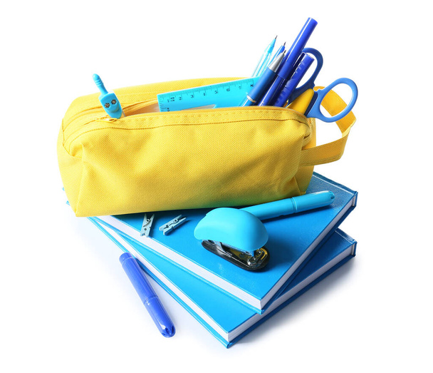 Pencil case and stationery on white background - Photo, Image