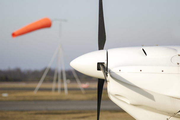 wind sock and plane - Photo, Image