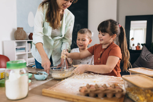 family baking together at home - 写真・画像