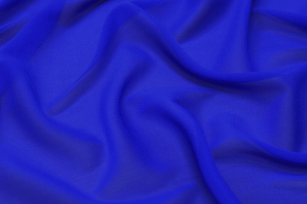 Blue fabric texture background, wavy fabric soft blue color, luxury satin or silk cloth texture. - Фото, зображення
