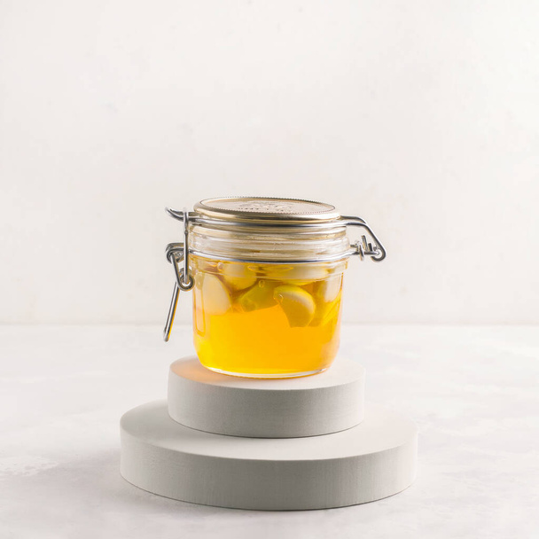 Fermented honey on white background - Photo, Image