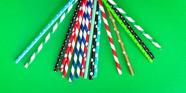 cocktail straws paper cup striped dotted mix cups straw scattered Flat lay useful ecology biodegradable disposable tableware bright summer concept party meal copy space food background top view - Photo, Image