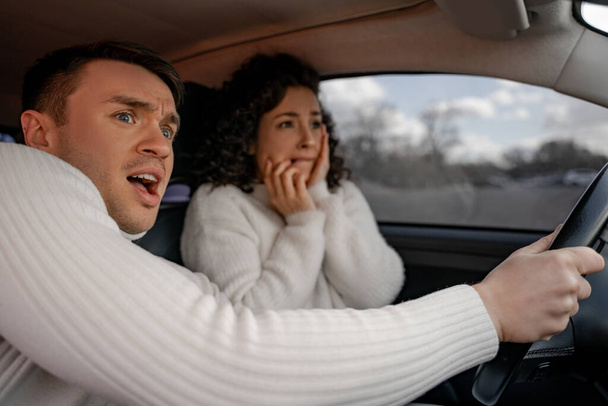 Scared european couple in automobile at accident - Photo, Image