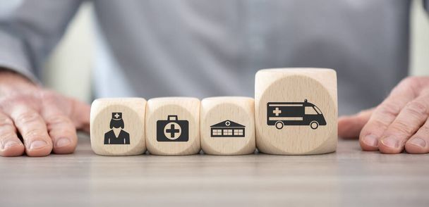 Wooden blocks with symbol of emergency concept - Photo, Image