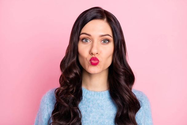Photo of pretty wavy hairdo person kiss lips look camera wear sweater isolated on pink color background - Zdjęcie, obraz