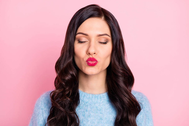 Photo of cute romantic young lady closed eyes send air kiss wear blue pullover isolated pink color background - Φωτογραφία, εικόνα
