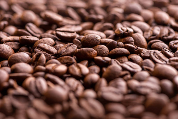 Roasted coffee beans. Background and macro - Φωτογραφία, εικόνα