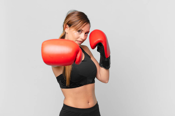 young pretty woman fitness and boxing concept - Fotoğraf, Görsel