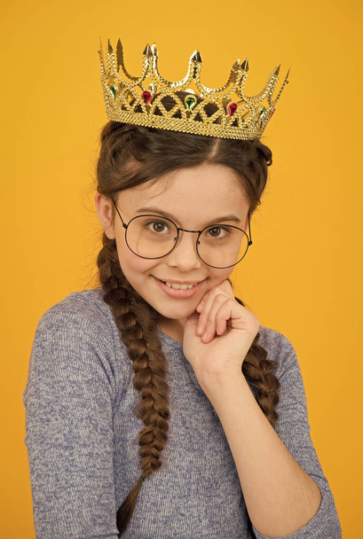 Adorable girl in glasses. Happy smiling princess. Excellent pupil. Success and happiness. Smartest princess. Intelligent princess. Little smart girl wear eyeglasses. Clever child. Royal education - Фото, зображення