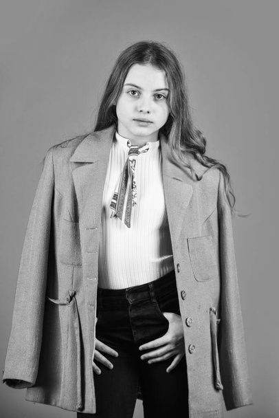 Pure beauty. small girl wear autumn jacket. retro fashion model. beauty and fashion. looking trendy this fall season. vintage concept. confident and ambitious. teen collection. stylish looking girl - Foto, afbeelding