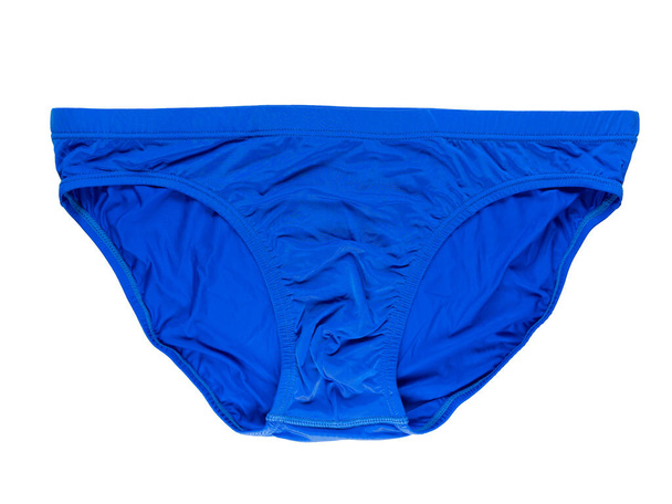 Мужские новые трусы или нижнее белье голубого цвета изолированы на белом фоне - Фото, изображение