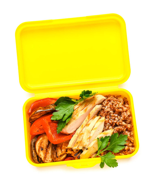 Lunchbox mit leckerem Essen auf weißem Hintergrund - Foto, Bild