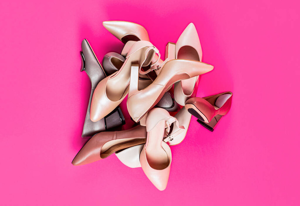 Fashionable women shoes isolated on pink background. View from above. Shoe for women - Foto, Bild