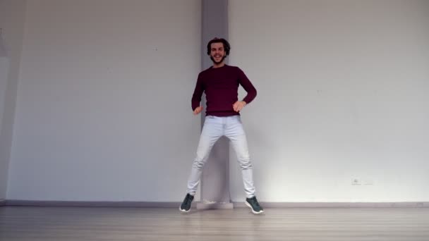 modern dance student shows coordination dancing in front of the camera   - Felvétel, videó