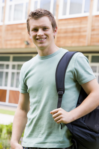 Male college student on campus - Фото, изображение