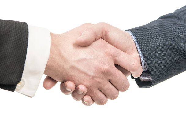 Male hands shaking as formal greeting business etiquette isolated on white, handshake. - Foto, imagen