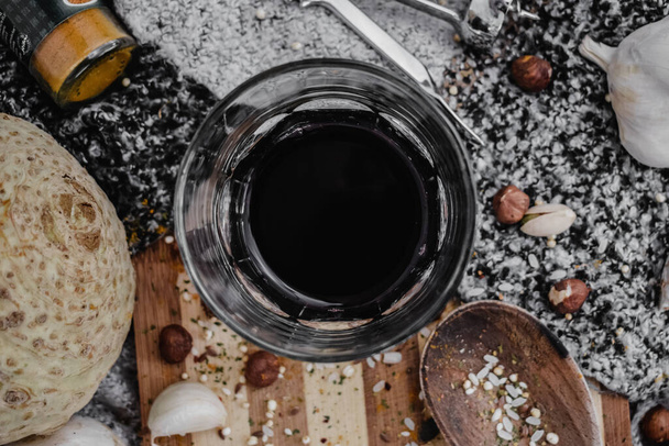 A top view of a glass with dark juice - Foto, Bild