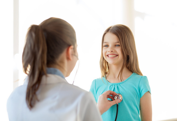 female doctor with stethoscope listening to child - Fotografie, Obrázek