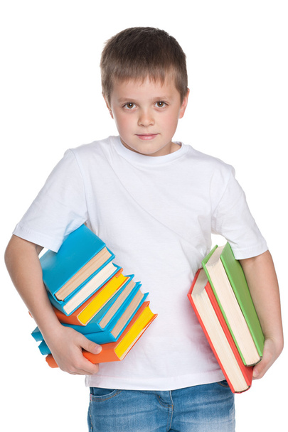 Kluger kleiner Junge mit Büchern - Foto, Bild