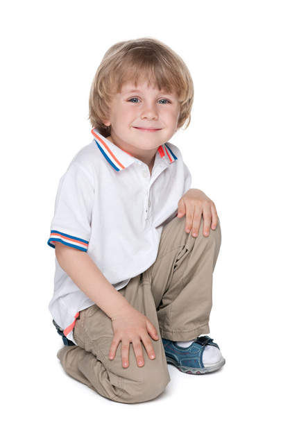 Happy preschool boy on the white - Photo, image