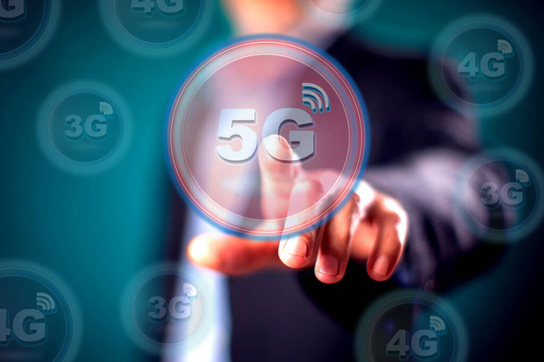 Businessman in suit press virtual 5g button. People and internet technology concept - Valokuva, kuva