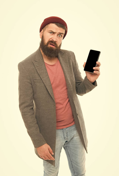 Mobile phone always with me. Hipster bearded man use smartphone. Internet surfing social networks with smartphone. Man with smartphone. Modern life demands modern gadgets. Mobile dependence concept - Foto, Imagem