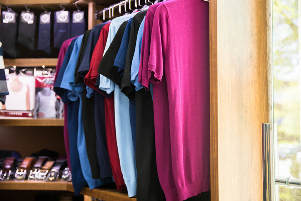 clothes for sale in modern sho - Foto, afbeelding