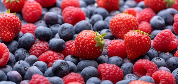 Raspberry, strawberry and blueberry berries - Foto, afbeelding
