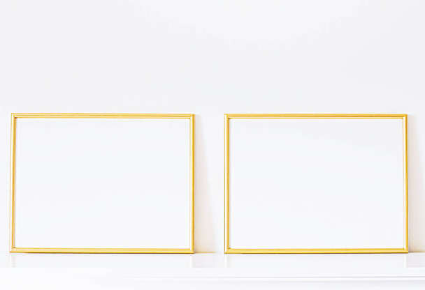 Golden frame on white furniture, luxury home decor and design for mockup, poster print and printable art, online shop showcase - Фото, изображение