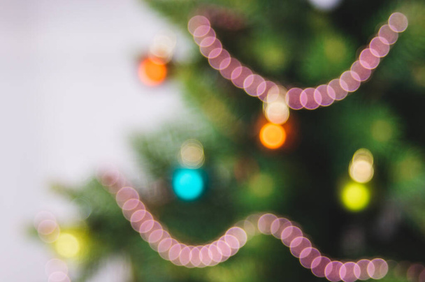 blured christmas Tree with Decorations. artificial spruce, - Zdjęcie, obraz