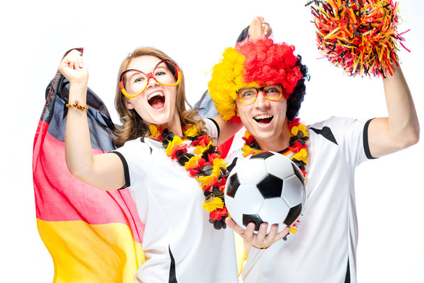 couple of enthusiastic German sport soccer fans celebrating victory on white background - Foto, immagini