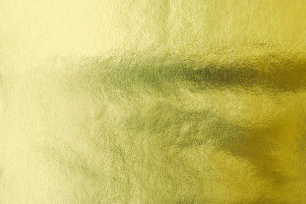 Blattgold Folie glänzend Verpackungspapier Textur Hintergrund für Tapeten Dekoration Element - Foto, Bild
