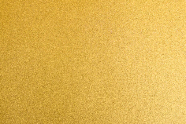 Feuille de papier d'emballage brillant feuille d'or texture fond pour élément de décoration en papier peint - Photo, image