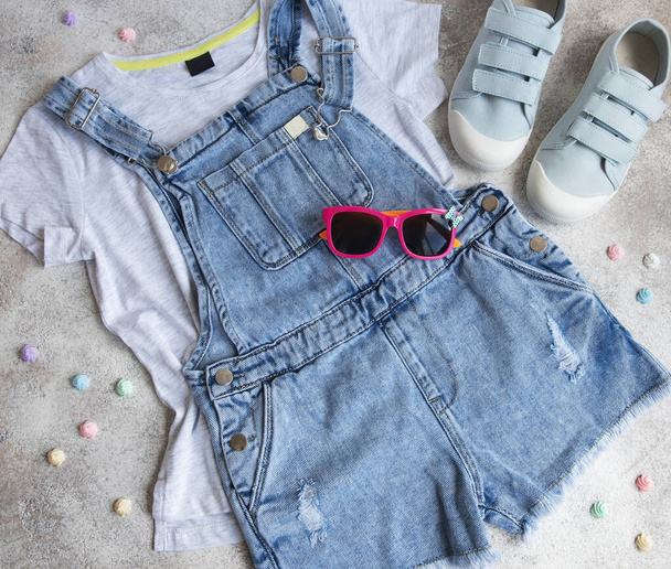 Set of children's clothes. The concept of online shopping - Photo, Image