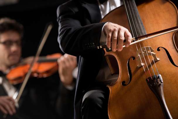 Symphony orchestra performance: celloist close-up - Zdjęcie, obraz