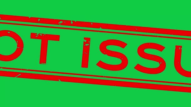 Grunge červené horké vydání slovo čtverec gumové razítko zoom na zeleném pozadí - Záběry, video