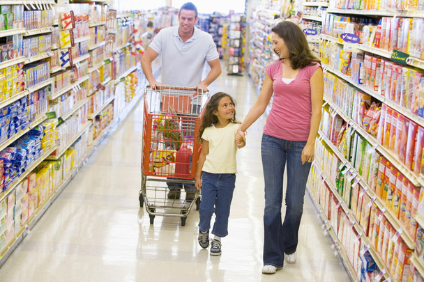 Family grocery shopping in supermarket - Foto, Imagem