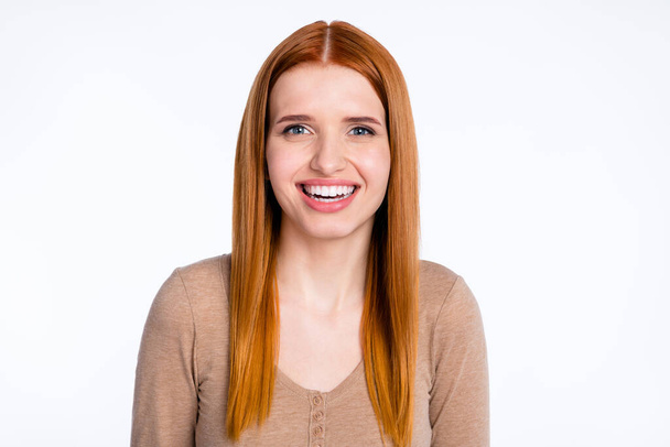 Photo of adorable shiny ginger lady wear beige shirt smiling laughing isolated white color background - 写真・画像