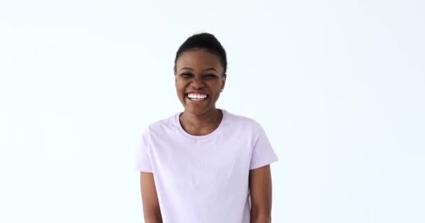 Woman laughing over white background - Felvétel, videó