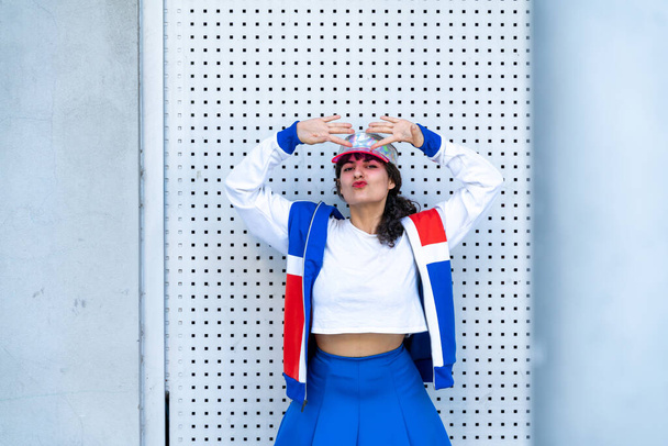 Young woman wearing retro sport outfits - Fotografie, Obrázek