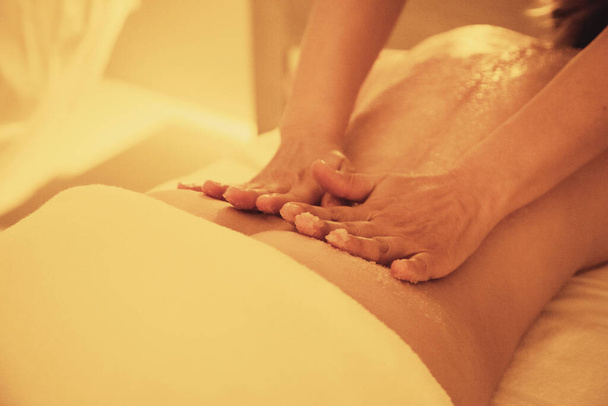 massage, hands, back, legs, woman, spa, relaxation, hot, yellow, wellness, bed, scrub, salt, skin - Photo, Image