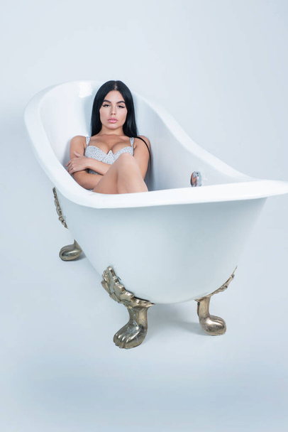 Cute and stylish. sexy woman relax in bathtub. female fashion and beauty. - Foto, afbeelding