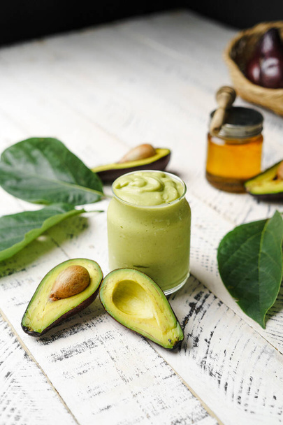 Avocado spinach and green smoothie healthy food white background - Valokuva, kuva