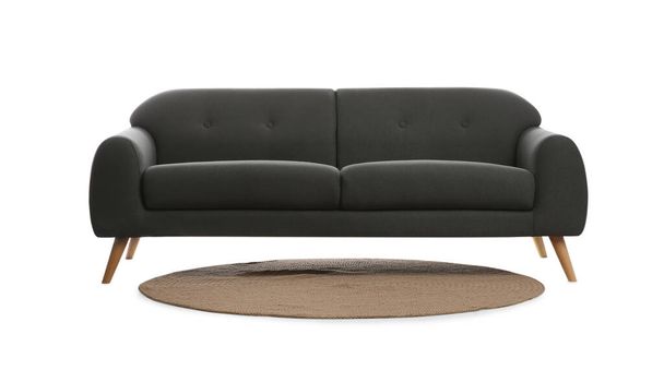 Comfortable grey sofa and rug on white background. Furniture for living room interior - Valokuva, kuva