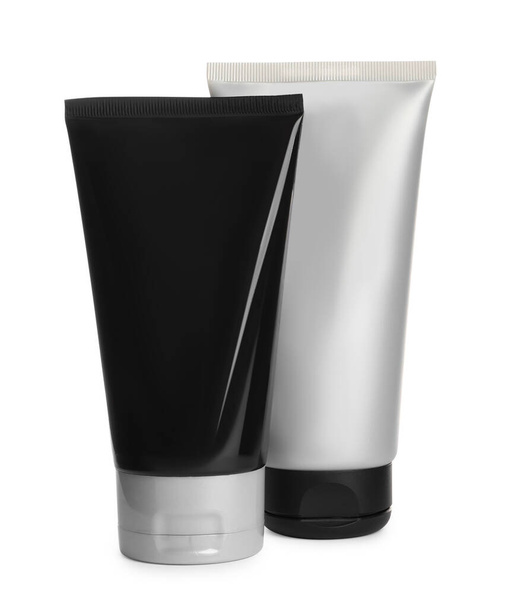 Tubes of men's facial creams on white background. Mockup for design - Foto, Bild